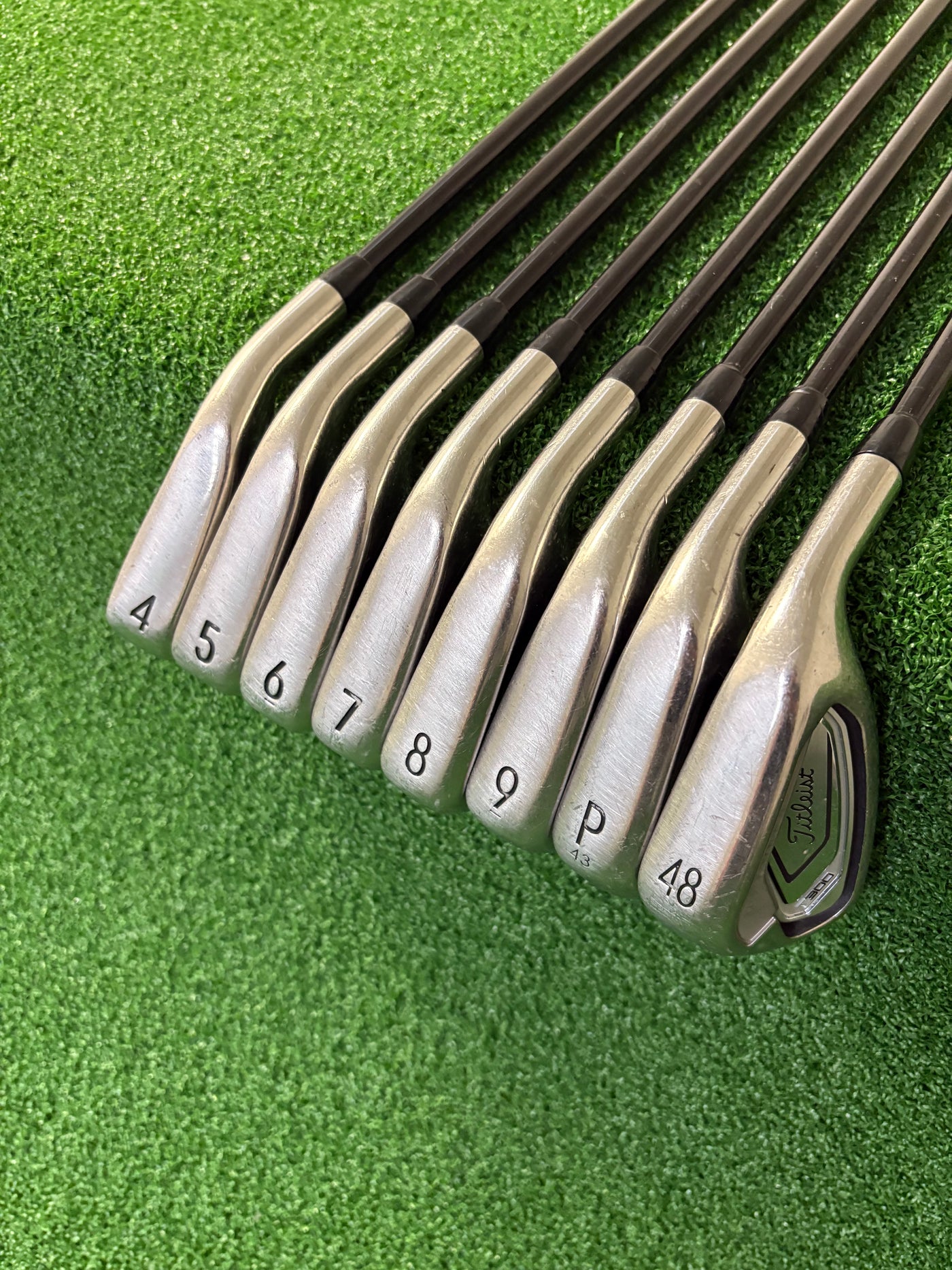 Titleist T-300 4-PW + 48* (Stiff)